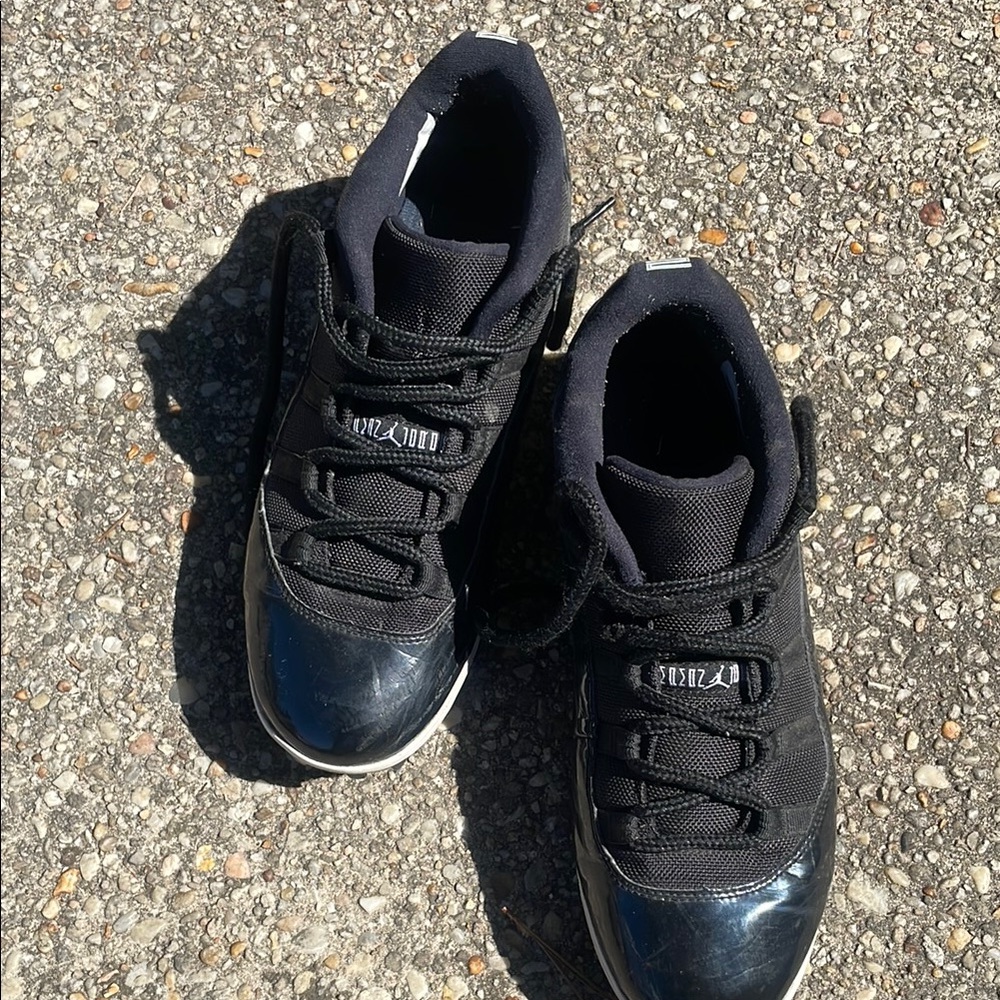 Black Jordan 11 low cleats 10.5
